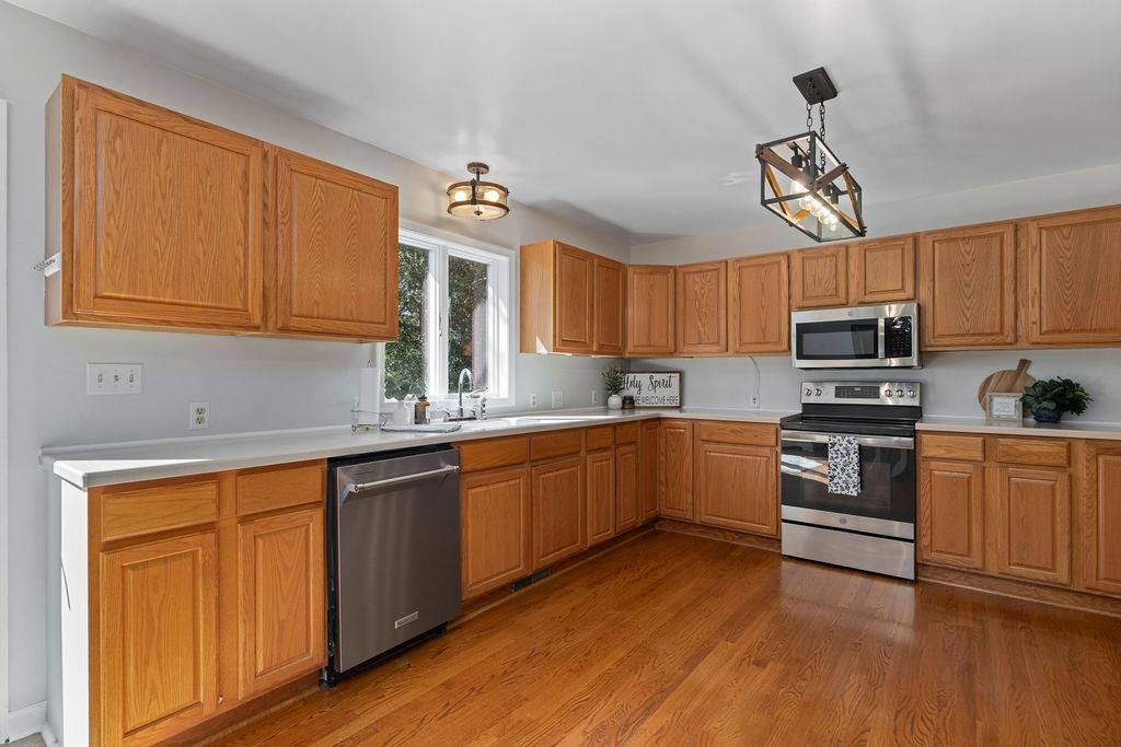 88 Yarmouth Road Stuarts Draft, VA 24477 - Photo 11 of 59 a kitchen with stainless steel appliances granite countertop a sink and cabinets