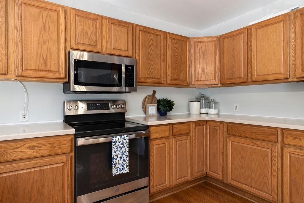 88 Yarmouth Road Stuarts Draft, VA 24477 - Photo 13 of 59 a kitchen with granite countertop wooden cabinets and stainless steel appliances