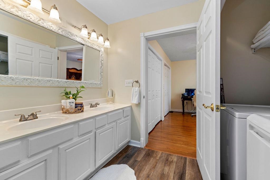 88 Yarmouth Road Stuarts Draft, VA 24477 - Photo 17 of 59 a spacious bathroom with a double vanity sink and a mirror