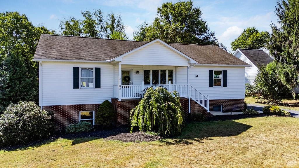 88 Yarmouth Road Stuarts Draft, VA 24477 - Photo 2 of 59 a front view of a house with a yard