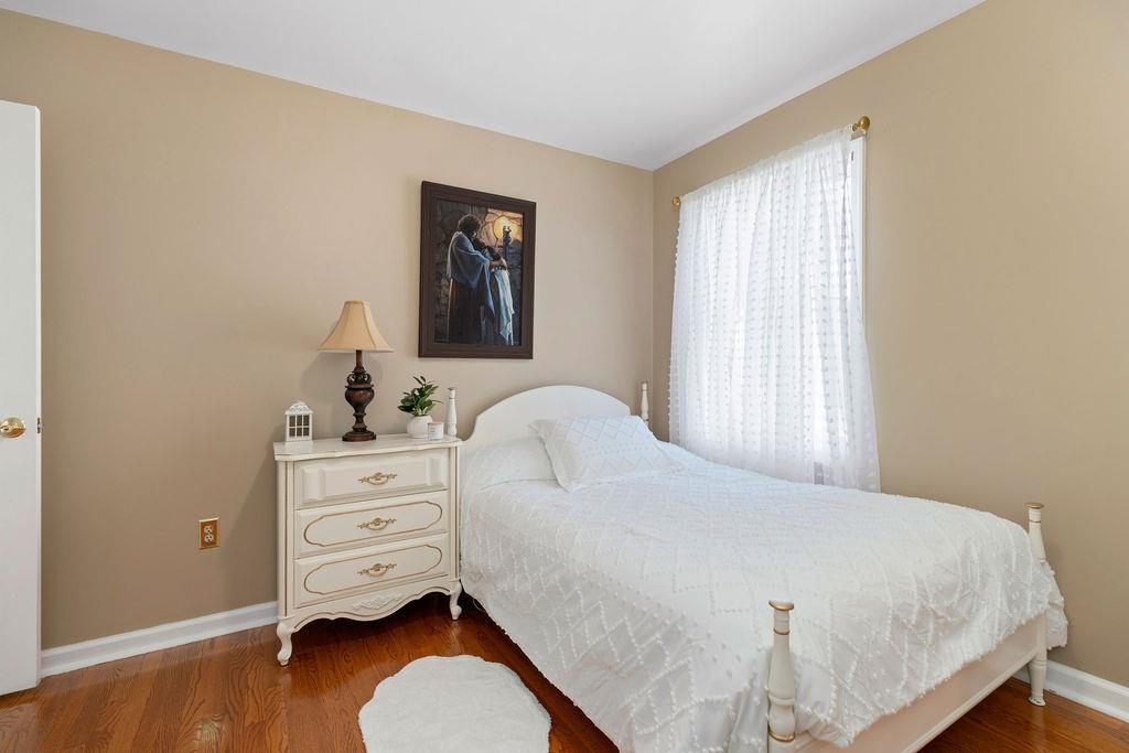 88 Yarmouth Road Stuarts Draft, VA 24477 - Photo 26 of 59 a bedroom with a bed and a dresser