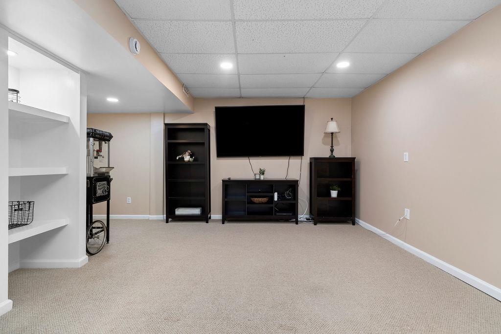 88 Yarmouth Road Stuarts Draft, VA 24477 - Photo 28 of 59 a living room with furniture and a flat screen tv