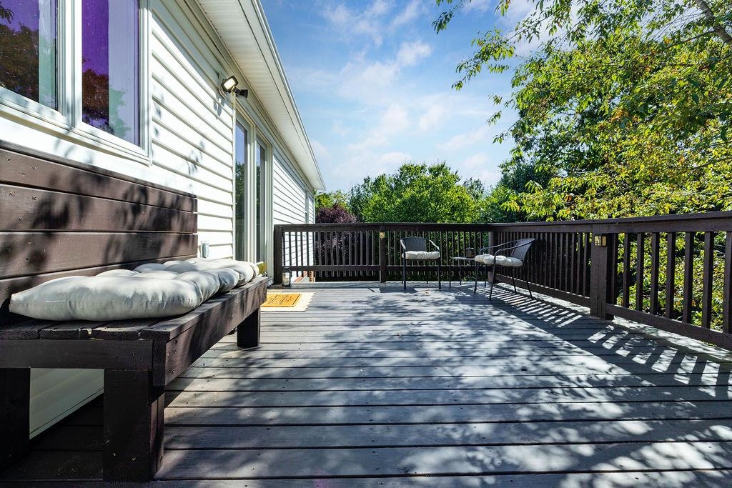 88 Yarmouth Road Stuarts Draft, VA 24477 - Photo 32 of 59 a backyard of a house with wooden floor table and chairs