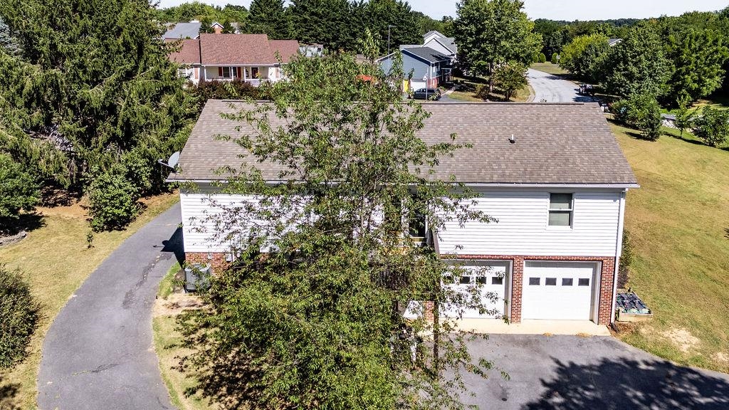 88 Yarmouth Road Stuarts Draft, VA 24477 - Photo 36 of 59 an aerial view of a house with a yard and large trees