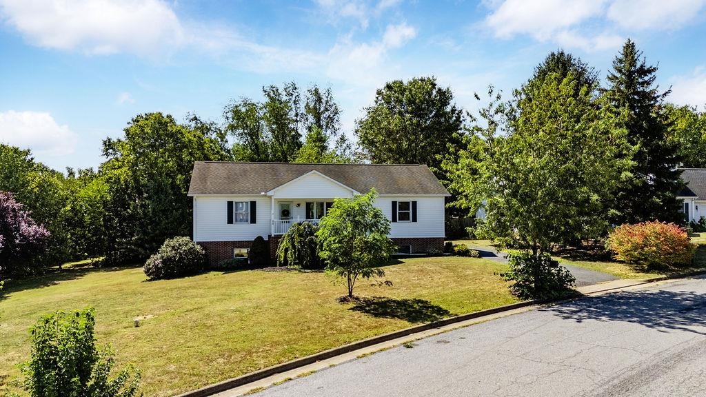 88 Yarmouth Road Stuarts Draft, VA 24477 - Photo 37 of 59 a front view of a house with a yard