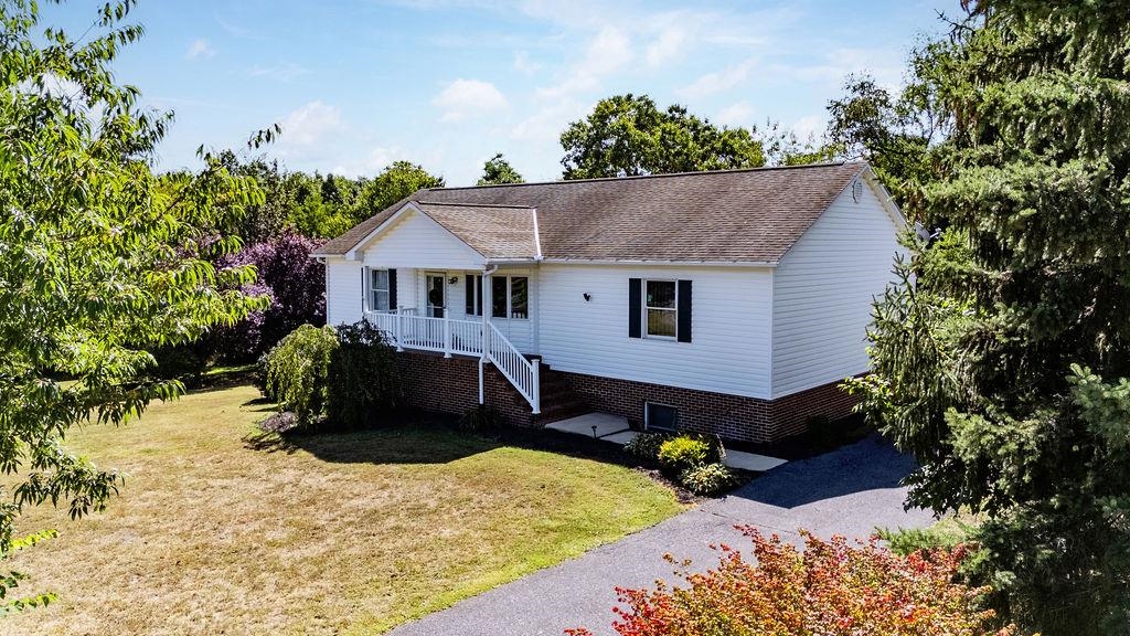 88 Yarmouth Road Stuarts Draft, VA 24477 - Photo 38 of 59 a front view of a house with a yard