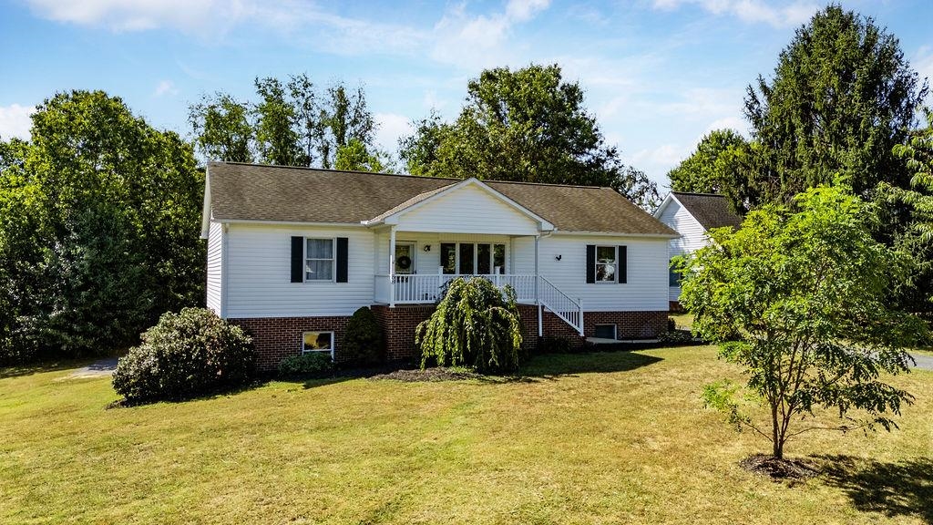 88 Yarmouth Road Stuarts Draft, VA 24477 - Photo 56 of 59 a front view of a house with a yard