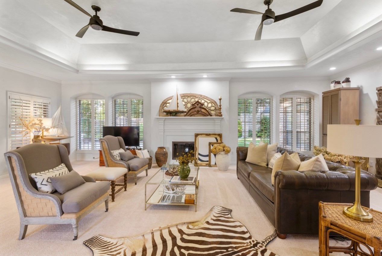 901 Longmire Road, Unit 51 Conroe, TX 77304 - Photo 2 of 48 This living room features venetian plaster walls, a finsh boasts elegance, a marble like texture that adds depth and high end sophistcation.