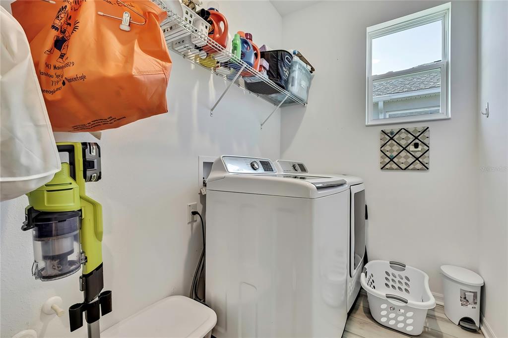 9764 Southwest 100th Avenue Ocala, FL 34481 - Photo 26 of 37 a bathroom with a toilet and a mirror