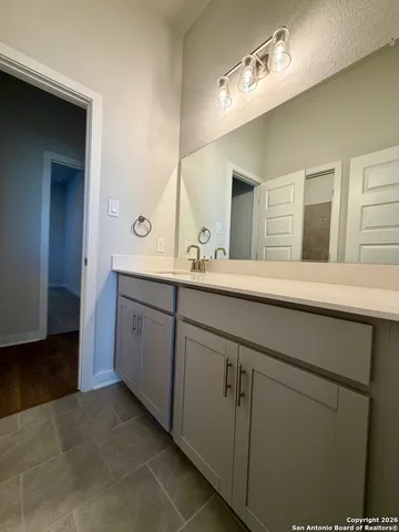 an empty room with a empty space and window