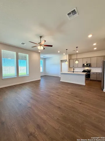 a bathroom with a sink and a shower