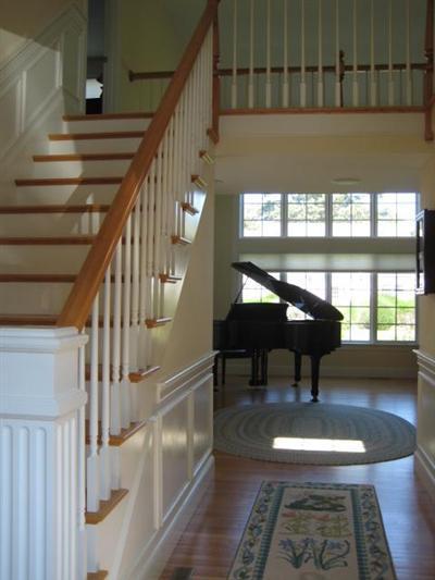 130 Parker Road, Unit B Osterville, MA 02655 - Photo 5 of 13 a view of entryway and hall with wooden floor