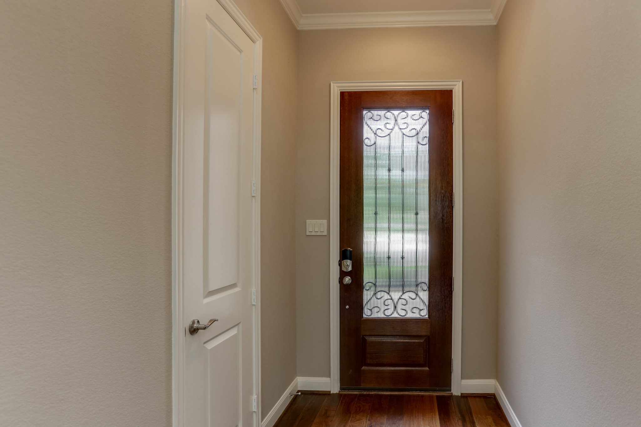 3 Herons Flight Place Spring, TX 77389 - Photo 11 of 27 a view of front door with wooden floor