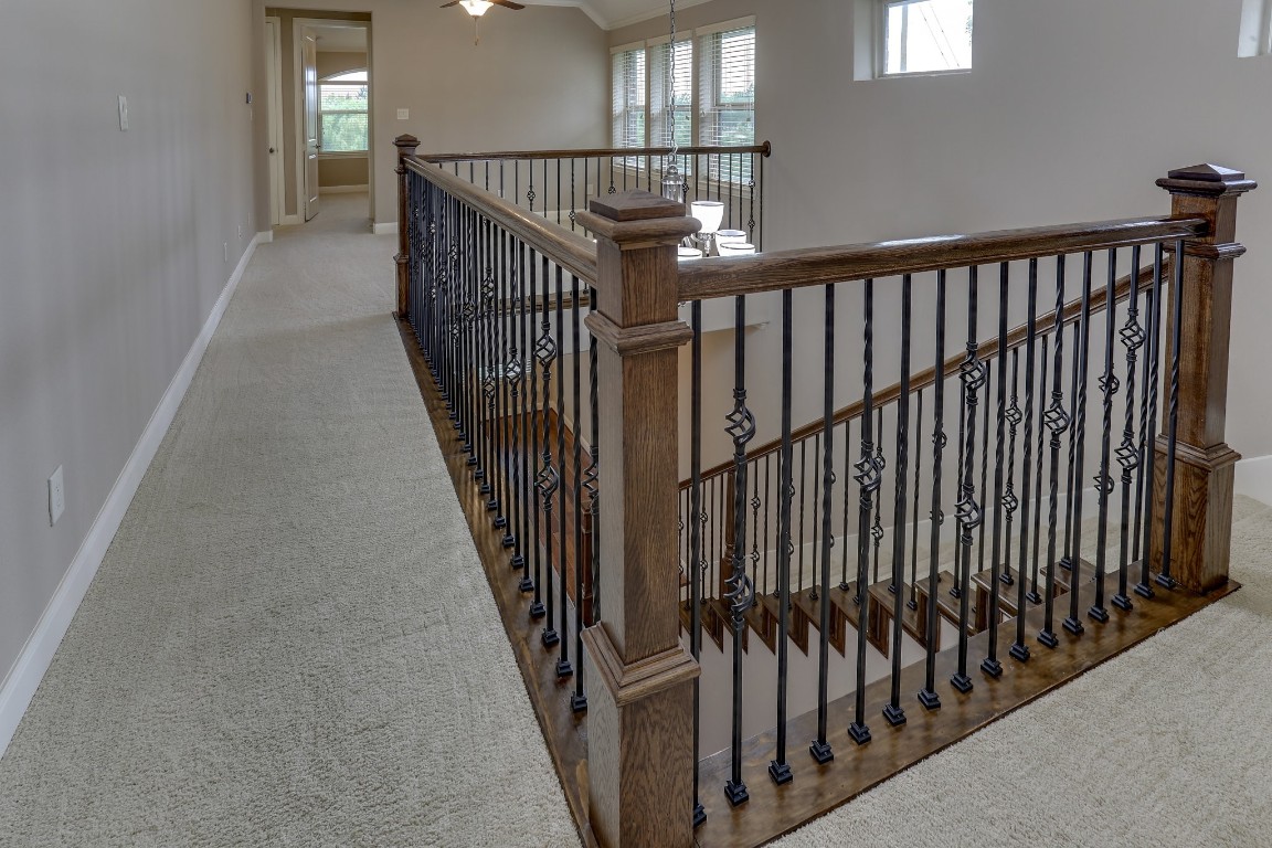 3 Herons Flight Place Spring, TX 77389 - Photo 13 of 27 a view of staircase with railing and a window