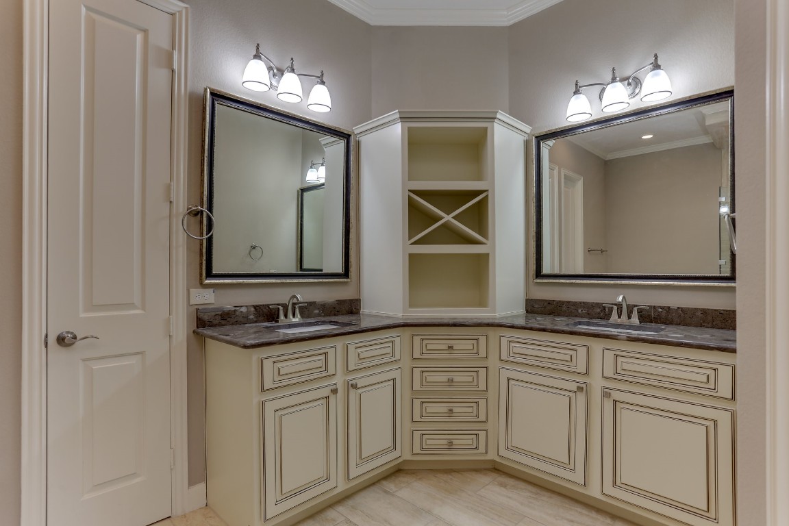 3 Herons Flight Place Spring, TX 77389 - Photo 16 of 27 a bathroom with double sink and a mirror