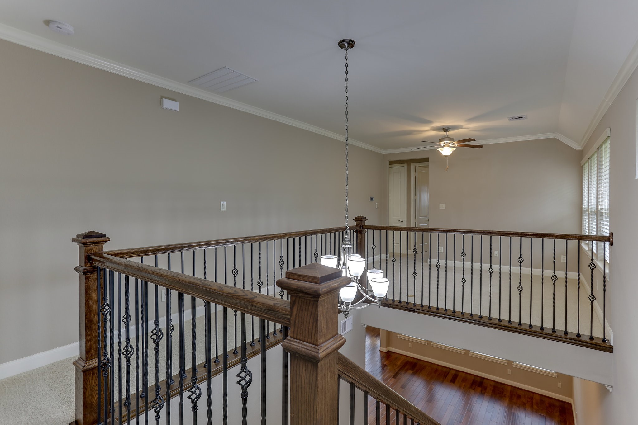 3 Herons Flight Place Spring, TX 77389 - Photo 18 of 27 a view of entryway and hall with wooden floor