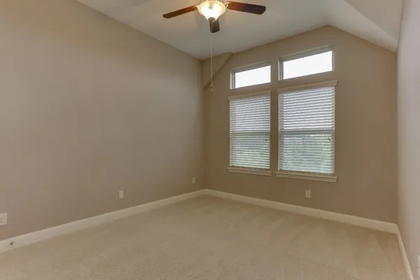 a view of balcony with wooden floor