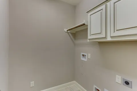 a bathroom with a sink and vanity