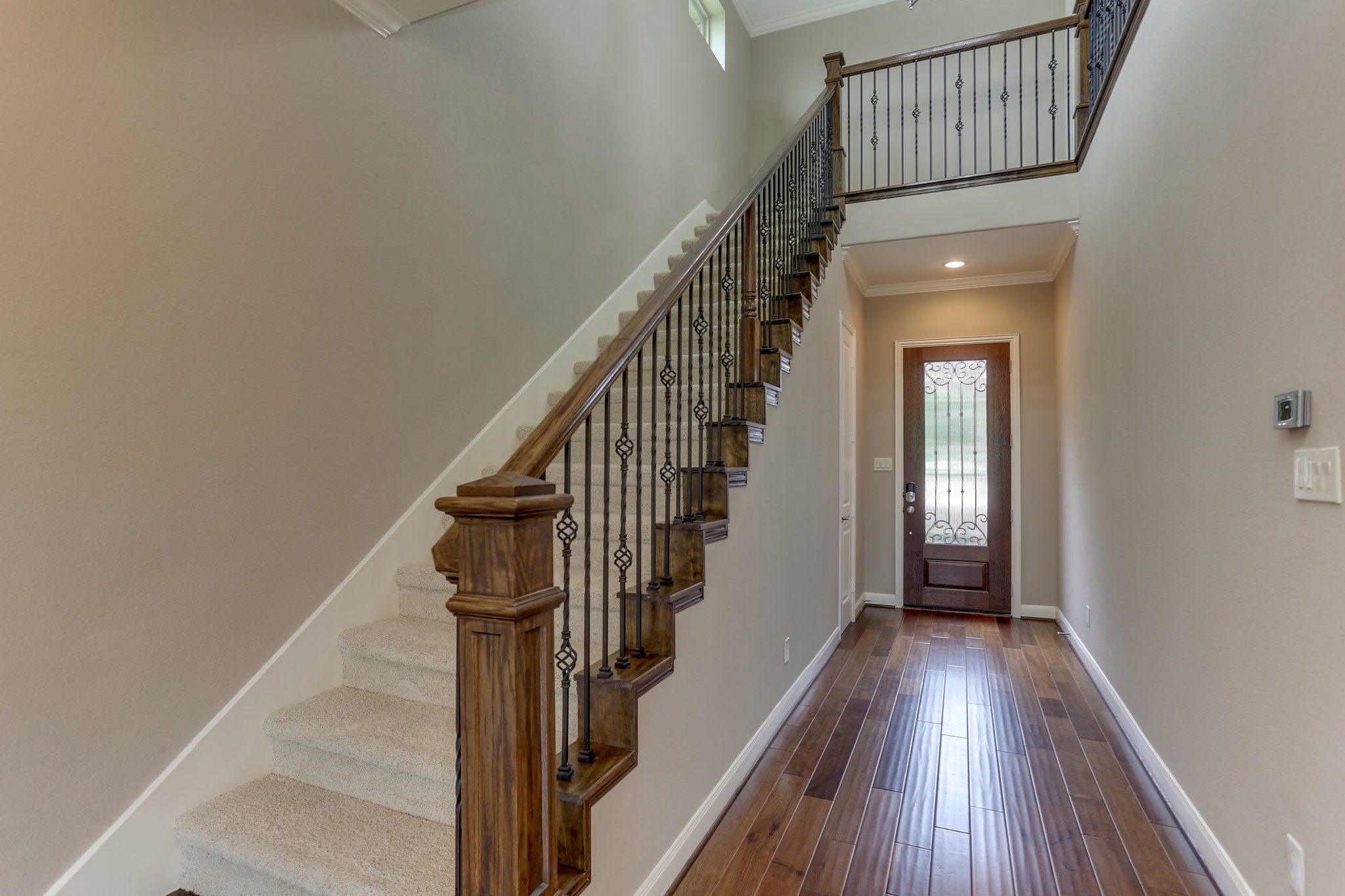 3 Herons Flight Place Spring, TX 77389 - Photo 10 of 27 a view of entryway and hall with wooden floor
