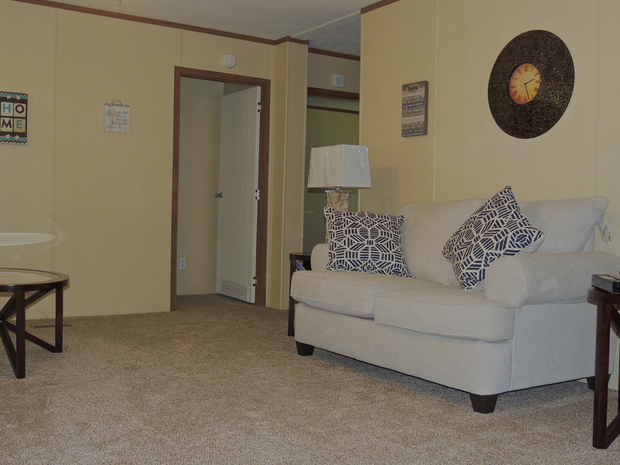 922 Arlington Ridge Road Erin, TN 37061 - Photo 11 of 18 a living room with a couch and a lamp