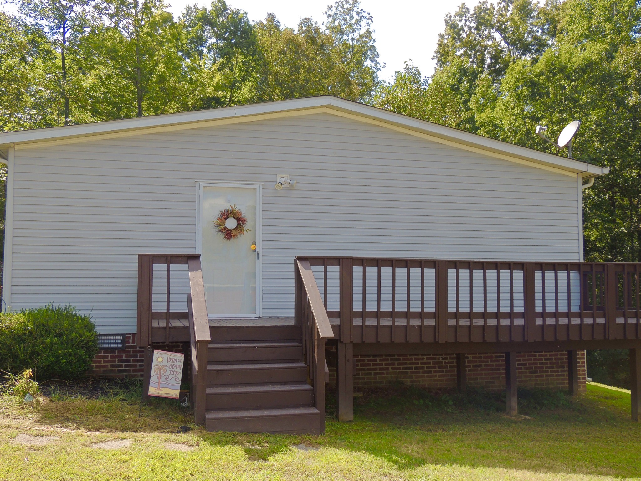 922 Arlington Ridge Road Erin, TN 37061 - Photo 4 of 18 a view of a backyard with sitting area