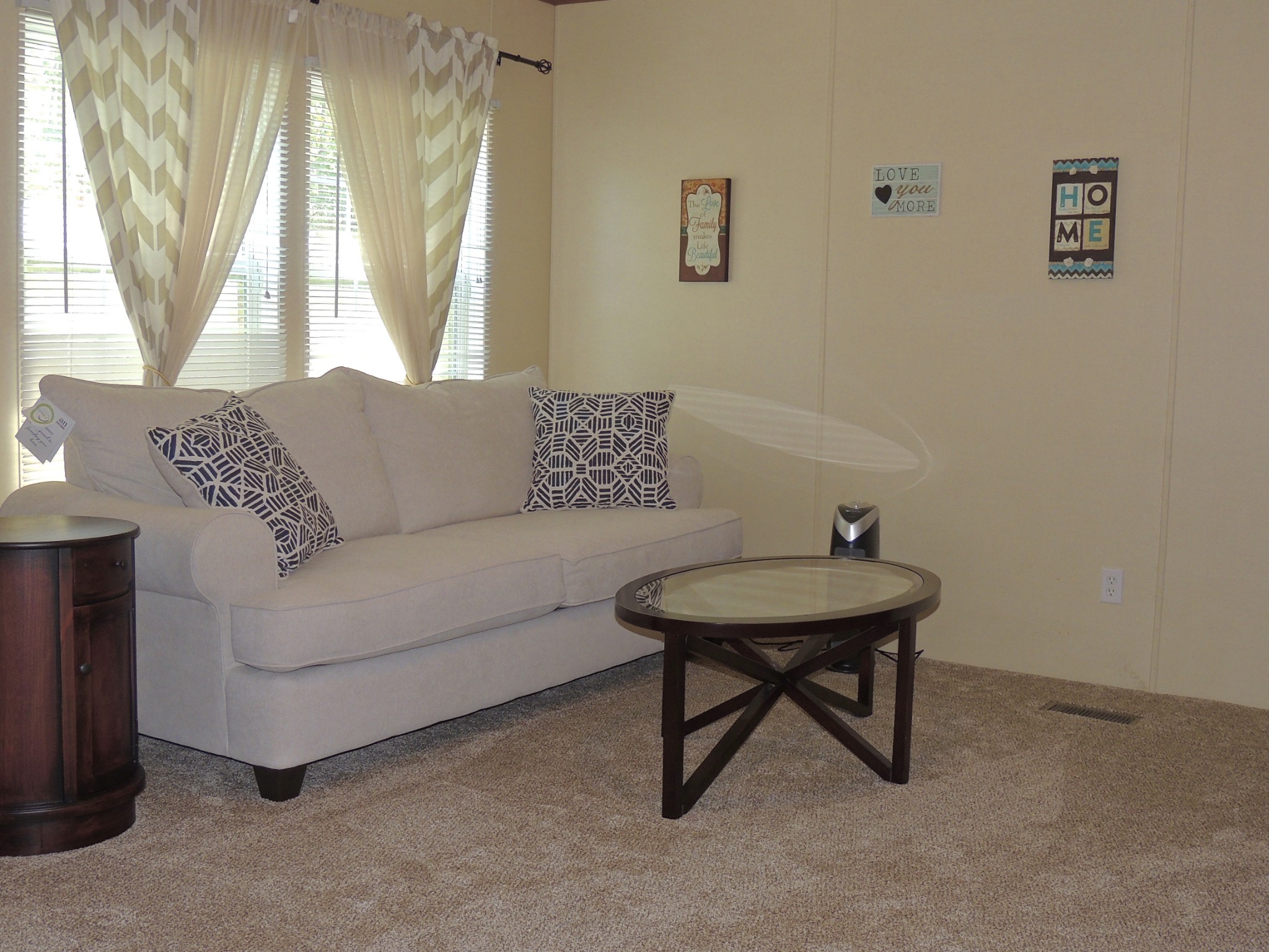 922 Arlington Ridge Road Erin, TN 37061 - Photo 10 of 18 a living room with furniture and a window