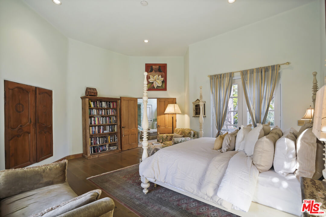 7332 Birdview Avenue Malibu, CA 90265 - Photo 30 of 71 a bedroom with a bed furniture and a window