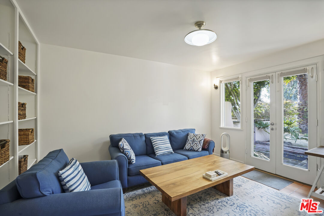 7332 Birdview Avenue Malibu, CA 90265 - Photo 38 of 71 a living room with furniture and a window