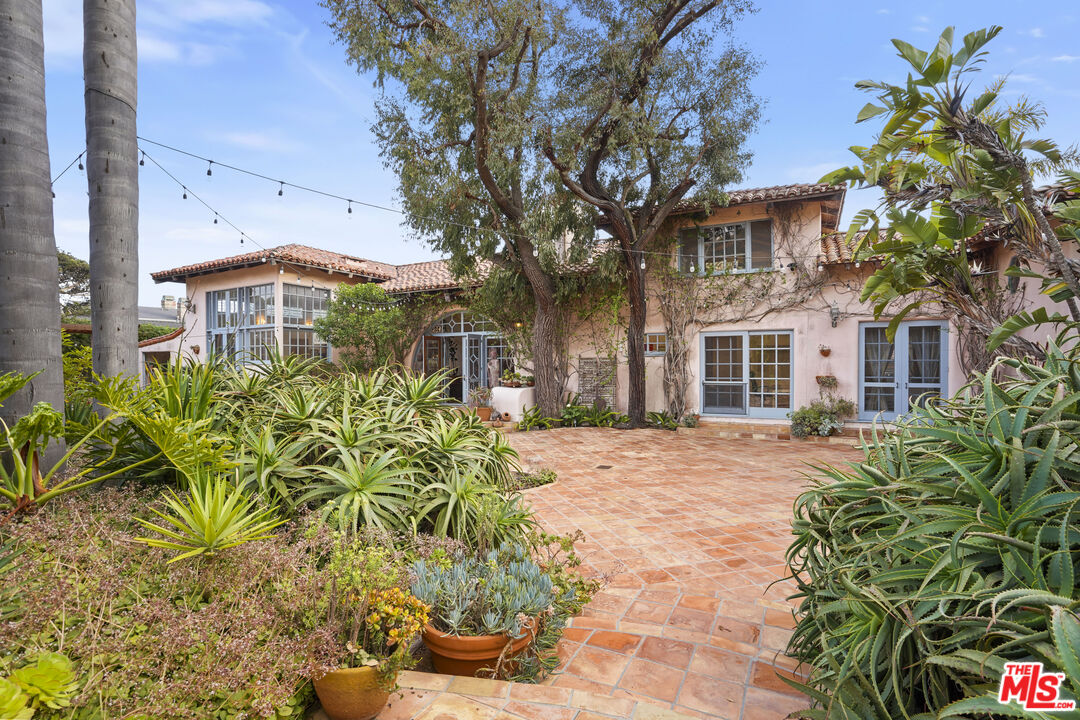 7332 Birdview Avenue Malibu, CA 90265 - Photo 53 of 71 a front view of a house with a yard