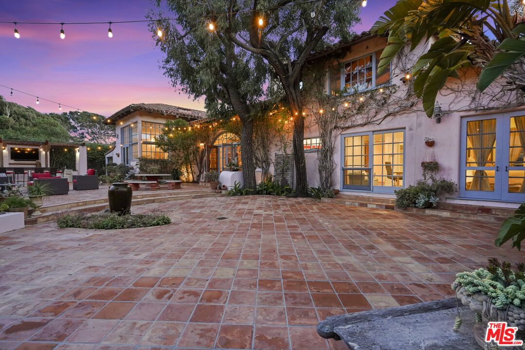 7332 Birdview Avenue Malibu, CA 90265 - Photo 56 of 71 a front view of a building with streets and trees