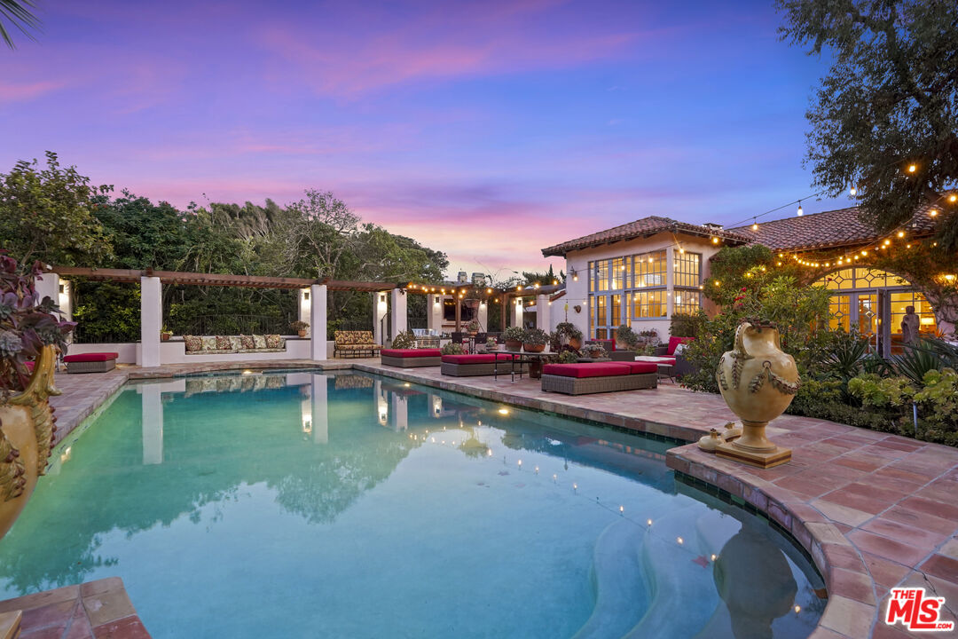 7332 Birdview Avenue Malibu, CA 90265 - Photo 62 of 71 a view of a swimming pool with a patio