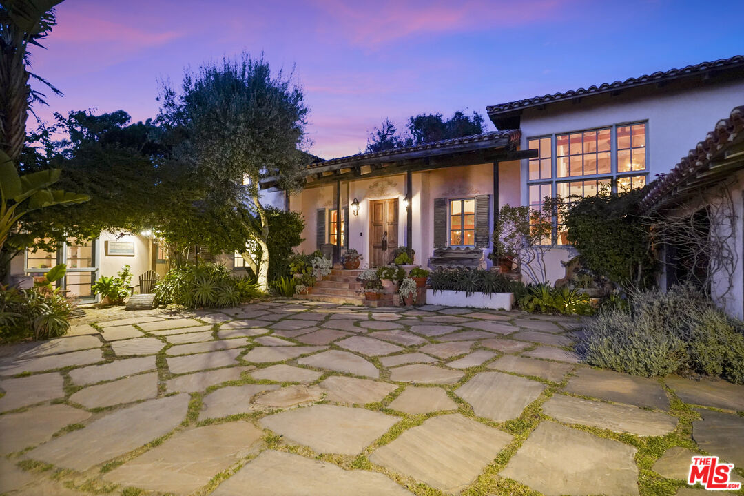 7332 Birdview Avenue Malibu, CA 90265 - Photo 66 of 71 a front view of a house with a yard