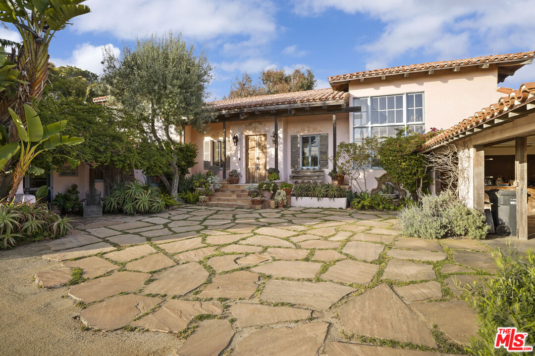 7332 Birdview Avenue Malibu, CA 90265 - Photo 8 of 71 a view of a house with a tree in front