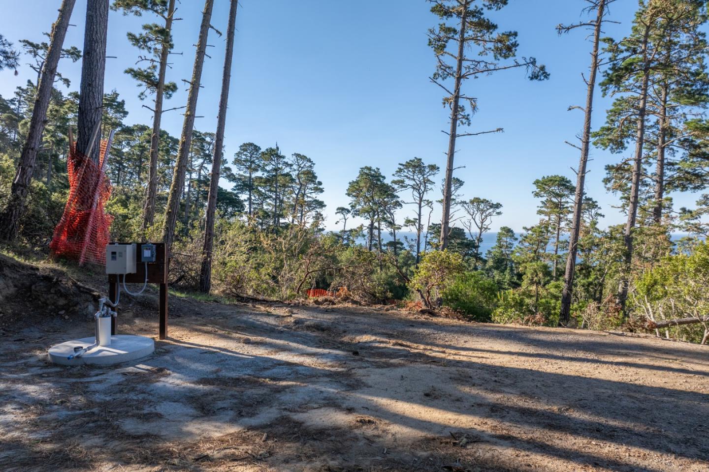 90 Crest Road Carmel, CA 93923 - Photo 6 of 8 a backyard of a house with lots of green space