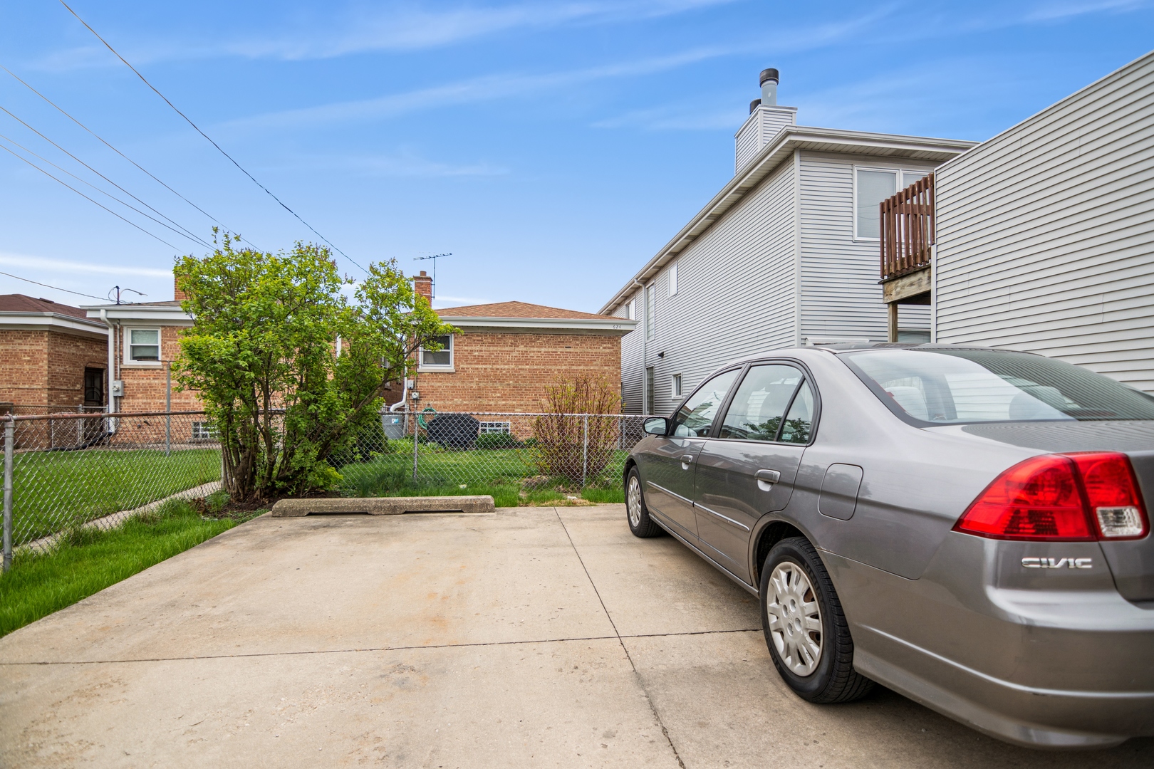 4624 West Addison Street Chicago, IL 60641 - Photo 14 of 14 a front view of a house with garage