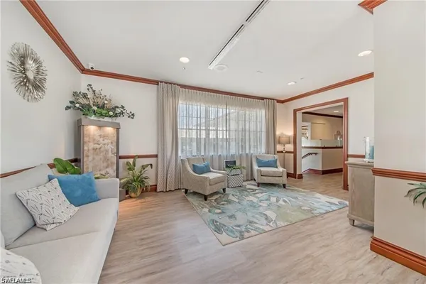 a living room with furniture or couch and a window