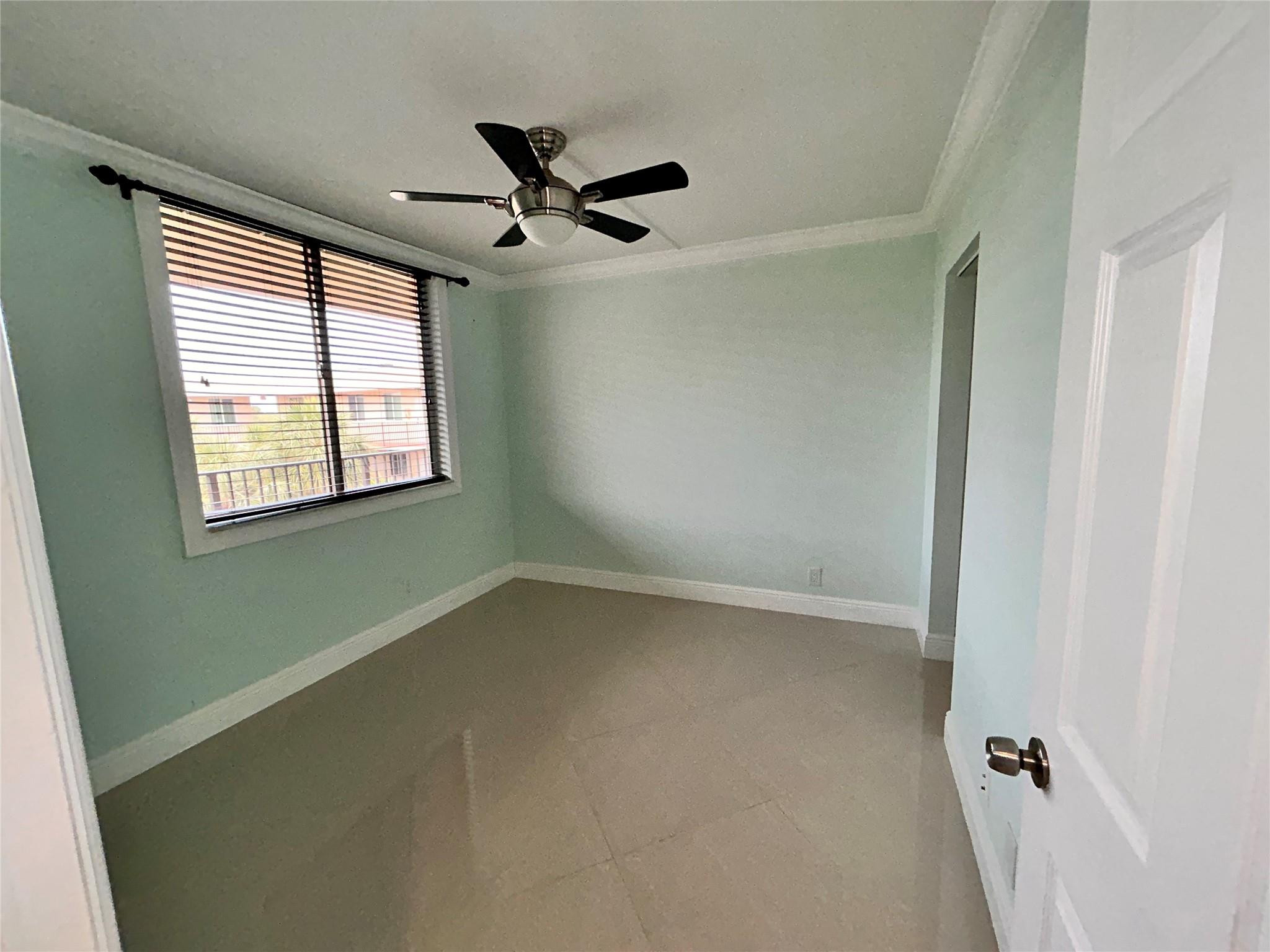 3233 Riverside Drive, Unit C504 Coral Springs, FL 33065 - Photo 23 of 38 Large 2nd Bedroom