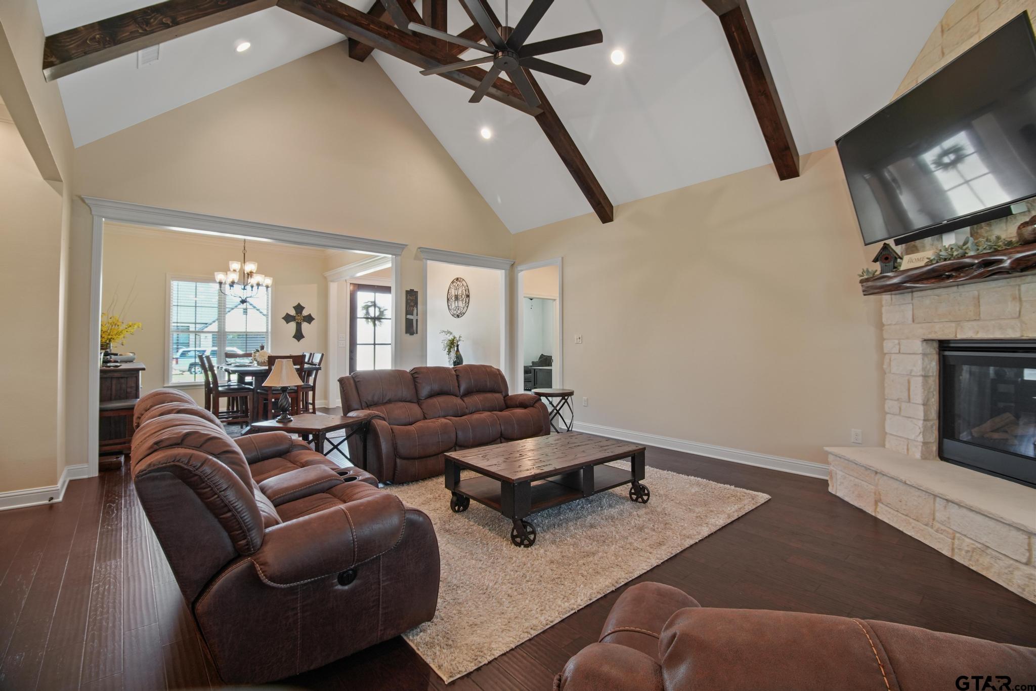 109 Nathan Road Chandler, TX 75758 - Photo 6 of 48 a living room with furniture and a fireplace
