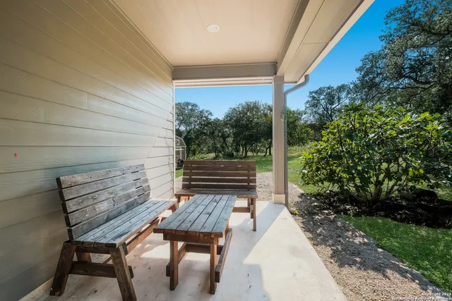 a view of a chairs in a patio