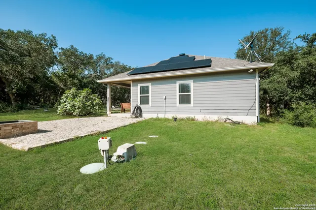 a house view with a garden space