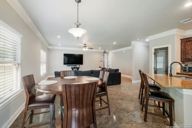 a view of a dining room with furniture