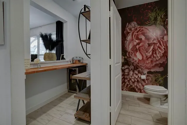 a bathroom with a toilet and sink