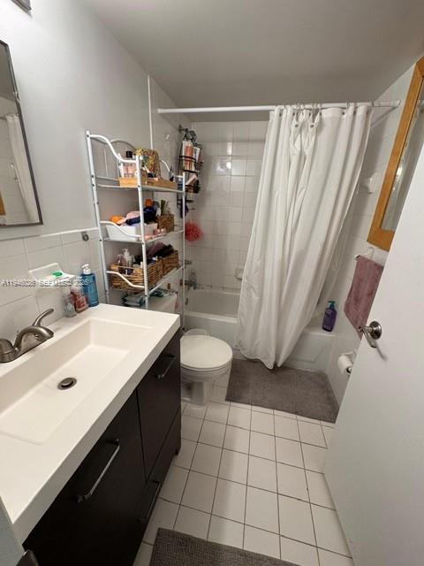 104 Southwest 9th Street, Unit 1403 Miami, FL 33130 - Photo 4 of 11 a bathroom with a sink toilet and shower