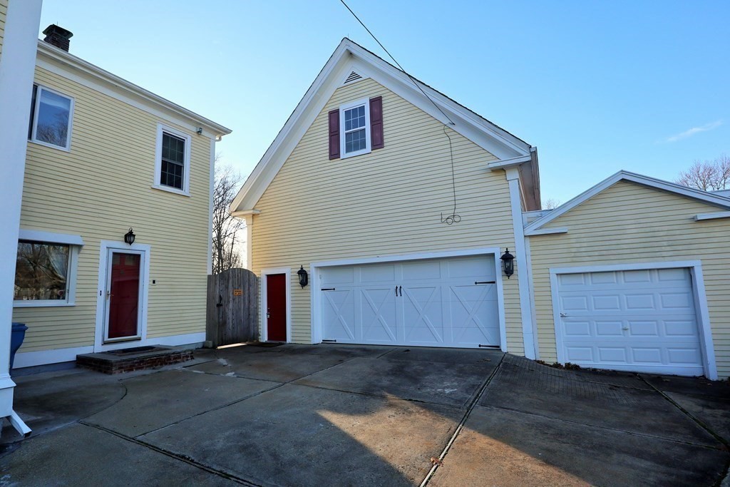 38 Pleasant Street Whitman, MA 02382 - Photo 4 of 21 a house view with a backyard space
