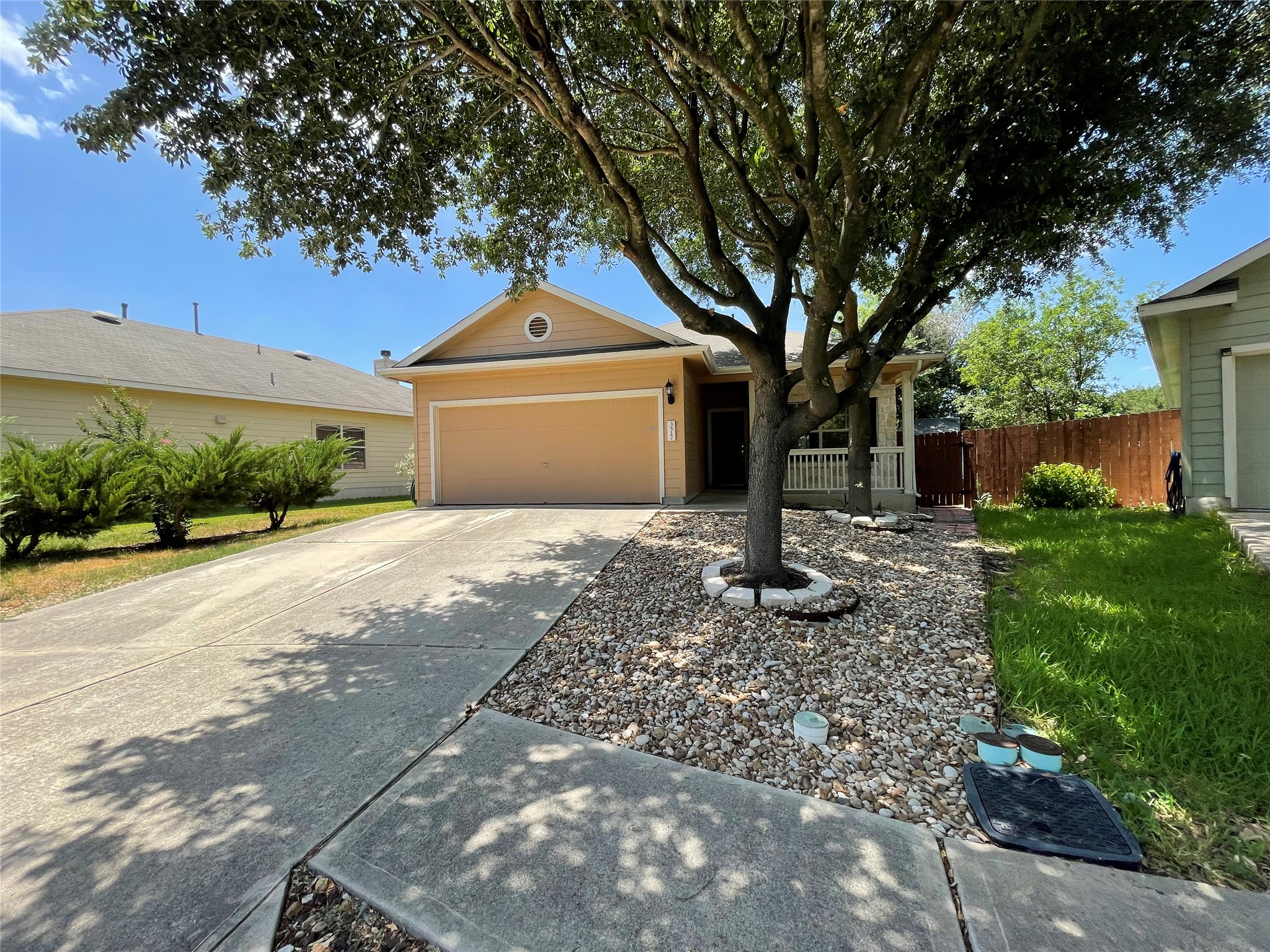 3517 Bronco Bend Loop Austin, TX 78744 - Photo 1 of 39 Ranch-style home with a garage and concrete driveway