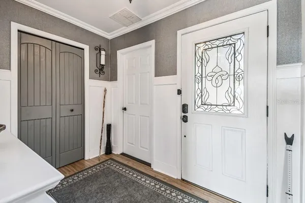a bathroom with a sink a mirror and shower