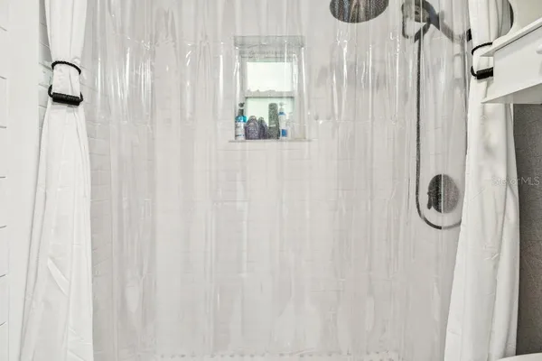 a view of indoor pool and sitting area