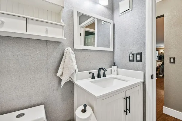 a view of a swimming pool with sitting area