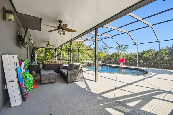 a view of balcony with wooden floor and fence