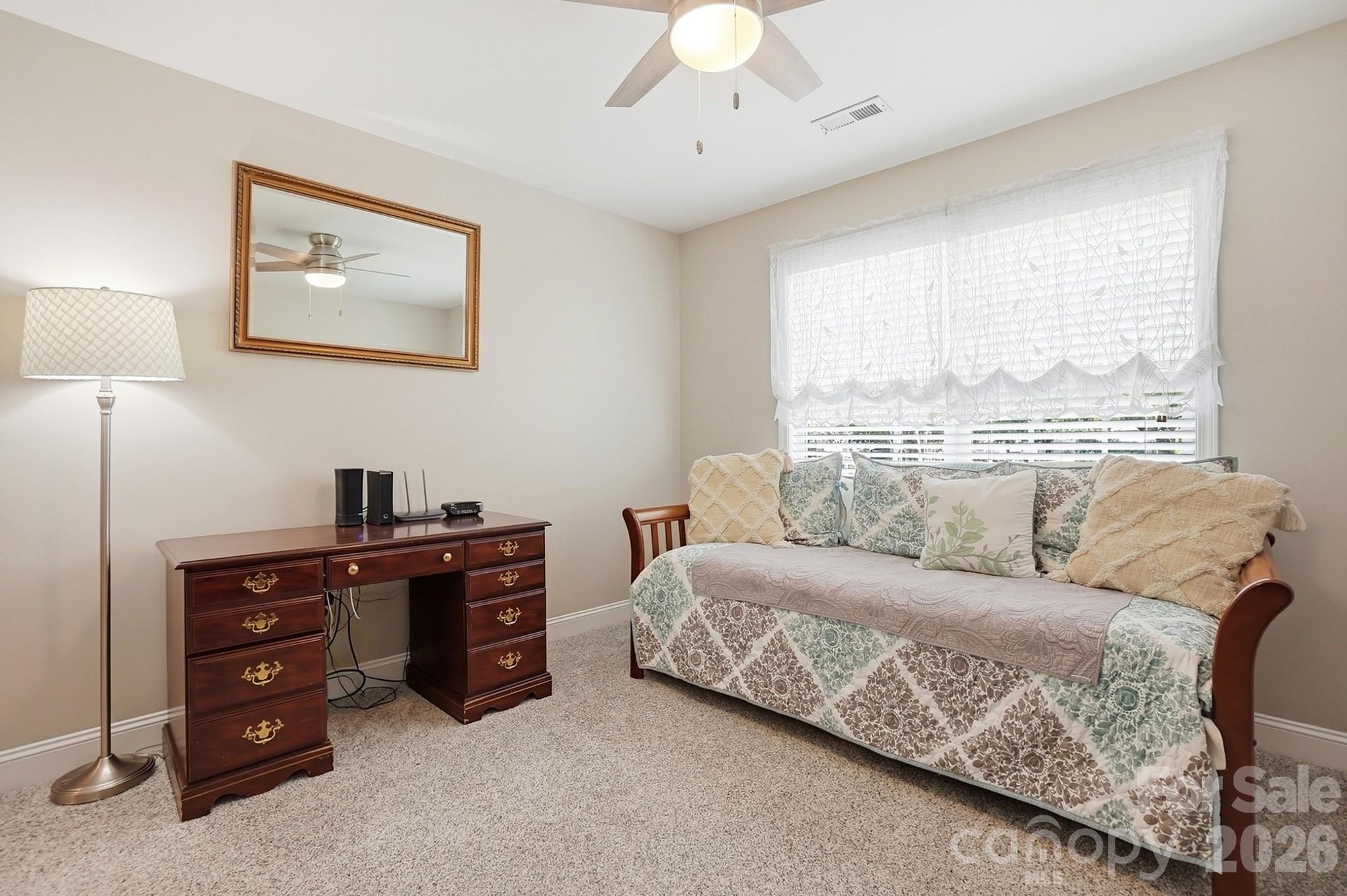 3324 Muddy Creek Road Midland, NC 28107 - Photo 33 of 46 a living room with furniture and a large window